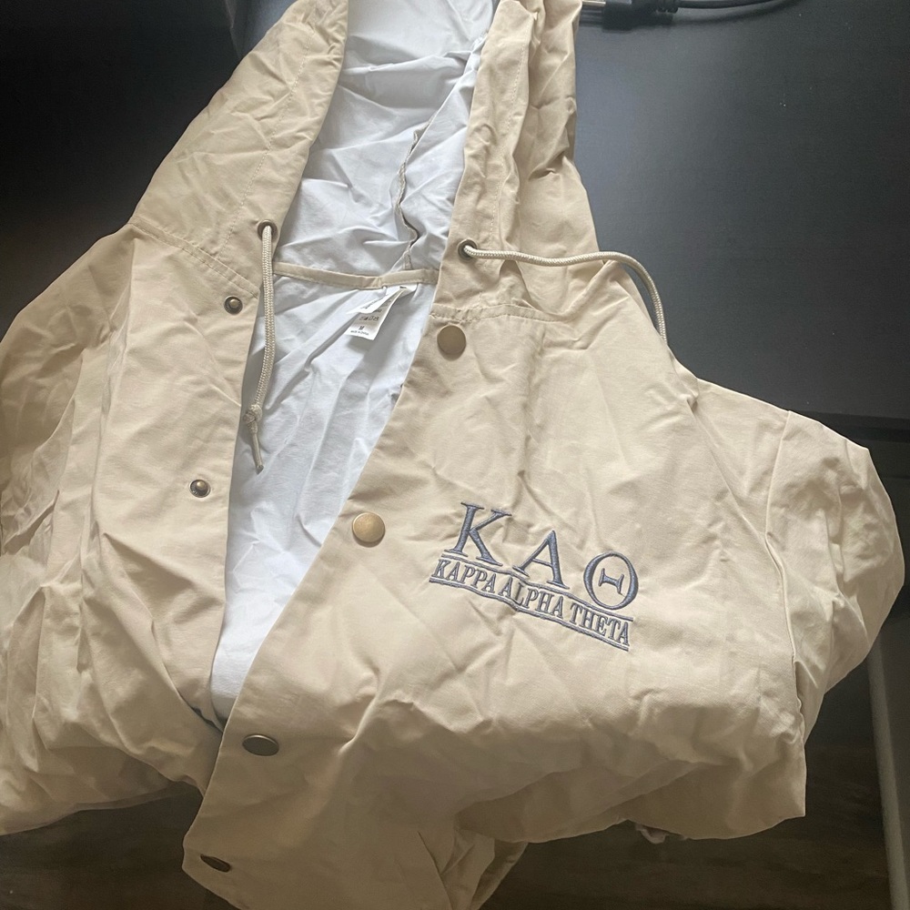 Kappa Alpha Theta beige rain jacket